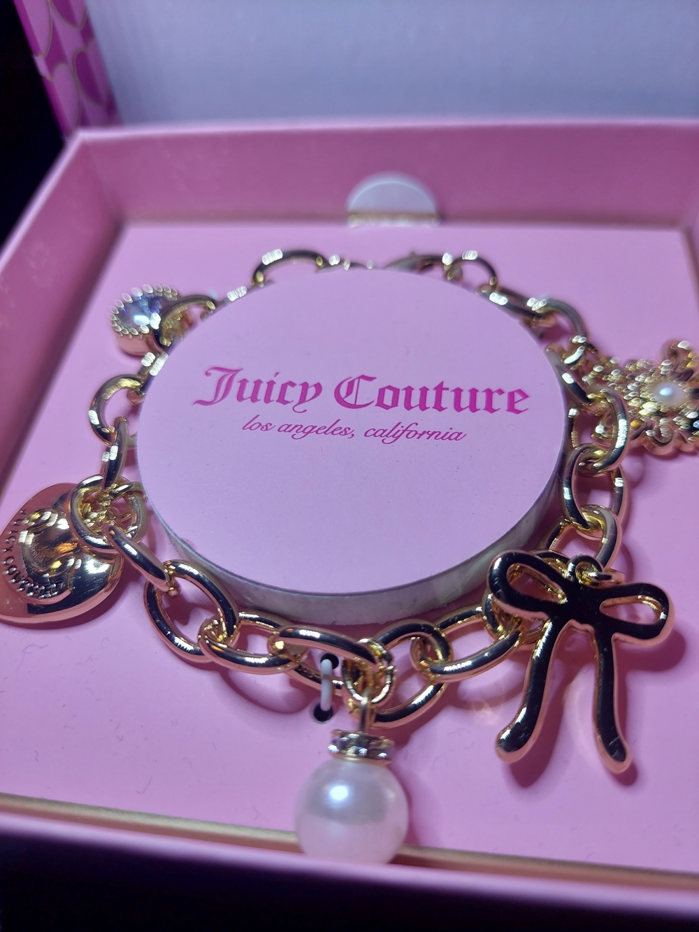Juicy Couture Gold-tone Charm Bracelet with Black Enamel Bow and Pearl